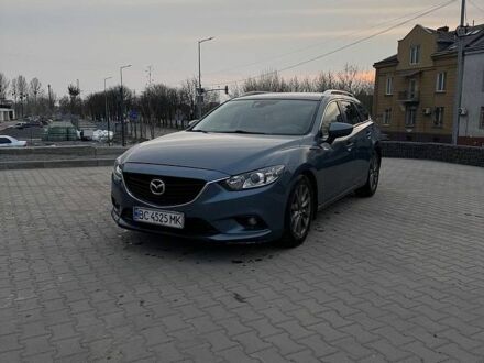 Синий Мазда 6, объемом двигателя 2.19 л и пробегом 280 тыс. км за 9700 $, фото 1 на Automoto.ua