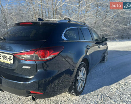 Синий Мазда 6, объемом двигателя 2 л и пробегом 250 тыс. км за 9500 $, фото 1 на Automoto.ua
