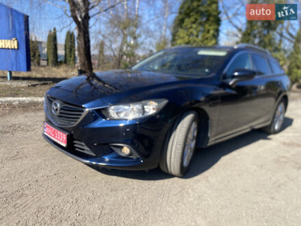 Синий Мазда 6, объемом двигателя 2.2 л и пробегом 225 тыс. км за 11850 $, фото 1 на Automoto.ua