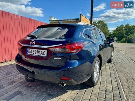 Синий Мазда 6, объемом двигателя 2.18 л и пробегом 267 тыс. км за 11000 $, фото 1 на Automoto.ua