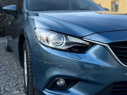 Синий Мазда 6, объемом двигателя 2.18 л и пробегом 209 тыс. км за 10099 $, фото 1 на Automoto.ua