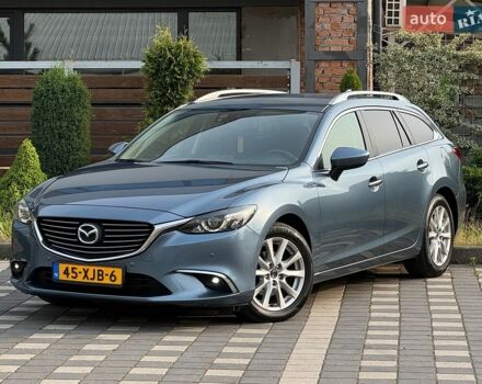 Синий Мазда 6, объемом двигателя 2.2 л и пробегом 242 тыс. км за 9990 $, фото 1 на Automoto.ua