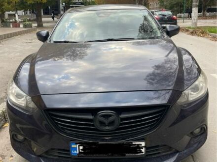 Синий Мазда 6, объемом двигателя 2 л и пробегом 98 тыс. км за 12500 $, фото 1 на Automoto.ua