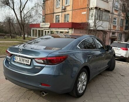 Синий Мазда 6, объемом двигателя 2.19 л и пробегом 138 тыс. км за 12800 $, фото 1 на Automoto.ua