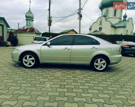 Зеленый Мазда 6, объемом двигателя 2 л и пробегом 250 тыс. км за 3550 $, фото 6 на Automoto.ua