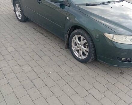 Зеленый Мазда 6, объемом двигателя 2 л и пробегом 246 тыс. км за 2900 $, фото 9 на Automoto.ua