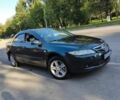 Зеленый Мазда 6, объемом двигателя 2 л и пробегом 301 тыс. км за 4583 $, фото 1 на Automoto.ua