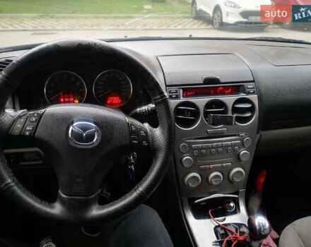 Зеленый Мазда 6, объемом двигателя 2 л и пробегом 248 тыс. км за 4350 $, фото 5 на Automoto.ua