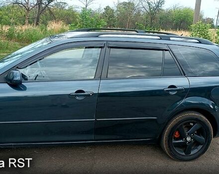 Зеленый Мазда 6, объемом двигателя 2 л и пробегом 358 тыс. км за 3580 $, фото 1 на Automoto.ua