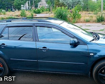 Зеленый Мазда 6, объемом двигателя 2 л и пробегом 358 тыс. км за 3580 $, фото 2 на Automoto.ua