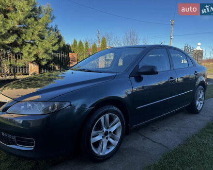 Зеленый Мазда 6, объемом двигателя 1.8 л и пробегом 230 тыс. км за 3950 $, фото 1 на Automoto.ua
