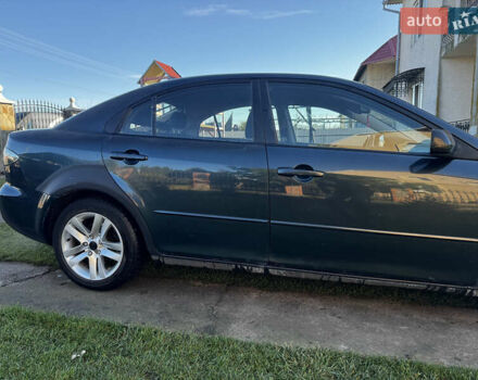 Зеленый Мазда 6, объемом двигателя 1.8 л и пробегом 230 тыс. км за 3950 $, фото 4 на Automoto.ua