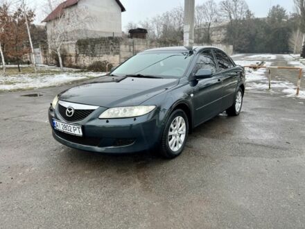 Зеленый Мазда 6, объемом двигателя 2 л и пробегом 280 тыс. км за 3999 $, фото 1 на Automoto.ua