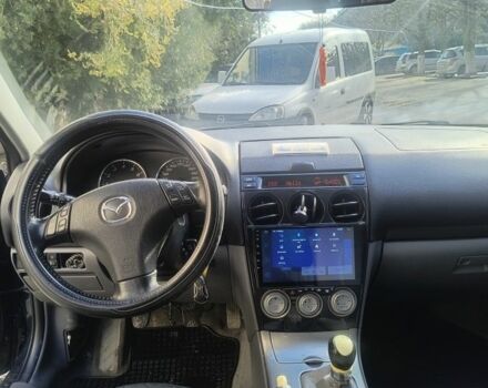 Зеленый Мазда 6, объемом двигателя 2 л и пробегом 336 тыс. км за 5000 $, фото 1 на Automoto.ua