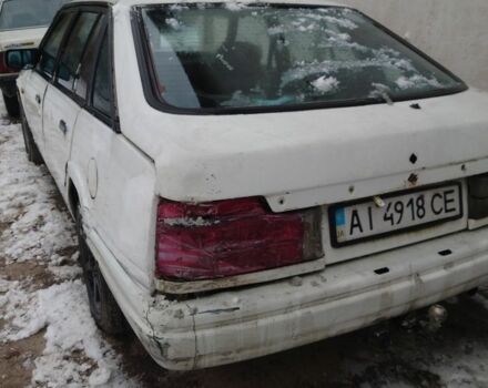 Белый Мазда 626, объемом двигателя 2 л и пробегом 350 тыс. км за 356 $, фото 1 на Automoto.ua