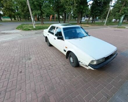 Белый Мазда 626, объемом двигателя 0 л и пробегом 400 тыс. км за 309 $, фото 2 на Automoto.ua