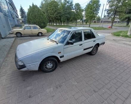 Белый Мазда 626, объемом двигателя 0 л и пробегом 400 тыс. км за 309 $, фото 1 на Automoto.ua