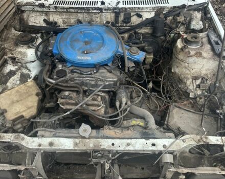 Белый Мазда 626, объемом двигателя 2 л и пробегом 400 тыс. км за 500 $, фото 2 на Automoto.ua