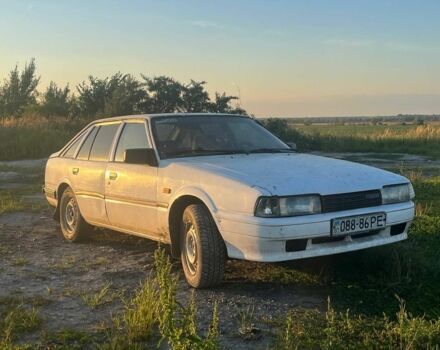 Белый Мазда 626, объемом двигателя 2 л и пробегом 350 тыс. км за 291 $, фото 5 на Automoto.ua