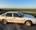Белый Мазда 626, объемом двигателя 2 л и пробегом 350 тыс. км за 291 $, фото 1 на Automoto.ua