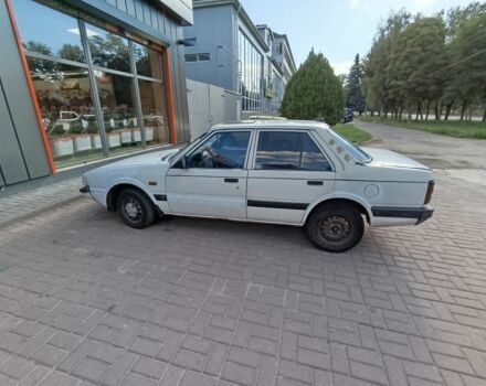 Белый Мазда 626, объемом двигателя 0 л и пробегом 400 тыс. км за 309 $, фото 5 на Automoto.ua