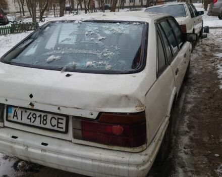 Белый Мазда 626, объемом двигателя 2 л и пробегом 350 тыс. км за 356 $, фото 2 на Automoto.ua