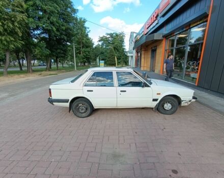 Белый Мазда 626, объемом двигателя 0 л и пробегом 400 тыс. км за 309 $, фото 3 на Automoto.ua