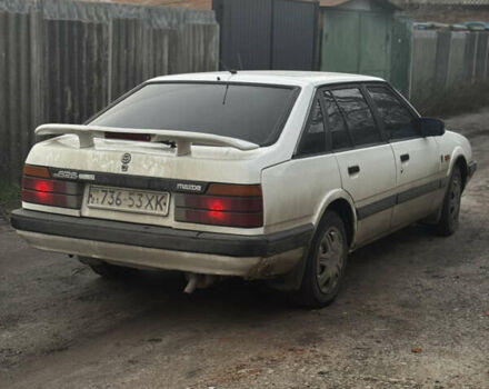 Белый Мазда 626, объемом двигателя 1.6 л и пробегом 380 тыс. км за 1300 $, фото 5 на Automoto.ua