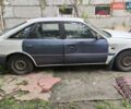 Белый Мазда 626, объемом двигателя 2 л и пробегом 242 тыс. км за 600 $, фото 1 на Automoto.ua