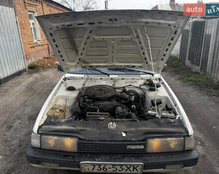Белый Мазда 626, объемом двигателя 1.6 л и пробегом 380 тыс. км за 1300 $, фото 18 на Automoto.ua