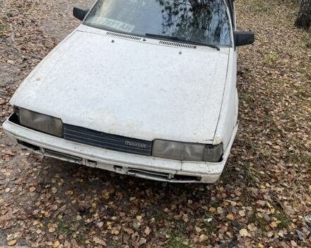 Белый Мазда 626, объемом двигателя 2 л и пробегом 265 тыс. км за 450 $, фото 1 на Automoto.ua