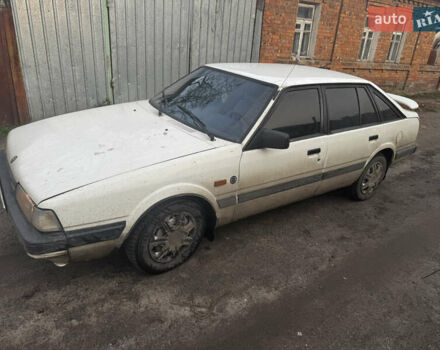 Белый Мазда 626, объемом двигателя 1.6 л и пробегом 380 тыс. км за 1300 $, фото 2 на Automoto.ua