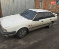 Белый Мазда 626, объемом двигателя 1.6 л и пробегом 380 тыс. км за 1300 $, фото 2 на Automoto.ua