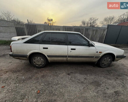 Белый Мазда 626, объемом двигателя 1.6 л и пробегом 380 тыс. км за 1300 $, фото 6 на Automoto.ua