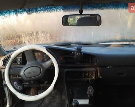 Белый Мазда 626, объемом двигателя 2 л и пробегом 330 тыс. км за 1300 $, фото 7 на Automoto.ua