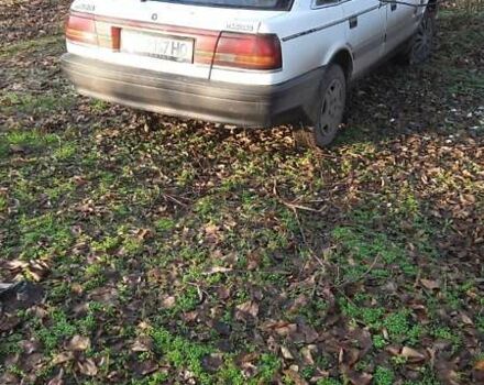 Белый Мазда 626, объемом двигателя 2 л и пробегом 330 тыс. км за 1300 $, фото 3 на Automoto.ua