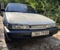 Белый Мазда 626, объемом двигателя 2 л и пробегом 260 тыс. км за 1200 $, фото 1 на Automoto.ua