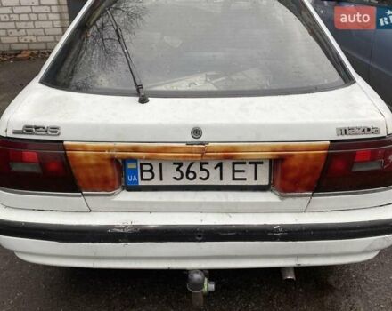 Белый Мазда 626, объемом двигателя 2 л и пробегом 400 тыс. км за 600 $, фото 2 на Automoto.ua