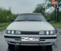 Белый Мазда 626, объемом двигателя 2 л и пробегом 307 тыс. км за 1500 $, фото 1 на Automoto.ua