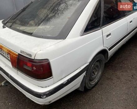 Белый Мазда 626, объемом двигателя 2 л и пробегом 400 тыс. км за 600 $, фото 3 на Automoto.ua