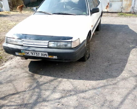 Білий Мазда 626, об'ємом двигуна 2 л та пробігом 320 тис. км за 1100 $, фото 2 на Automoto.ua