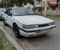Белый Мазда 626, объемом двигателя 2.01 л и пробегом 380 тыс. км за 700 $, фото 1 на Automoto.ua