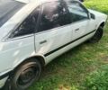 Білий Мазда 626, об'ємом двигуна 2 л та пробігом 200 тис. км за 607 $, фото 1 на Automoto.ua