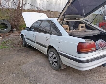 Белый Мазда 626, объемом двигателя 0 л и пробегом 360 тыс. км за 1000 $, фото 1 на Automoto.ua