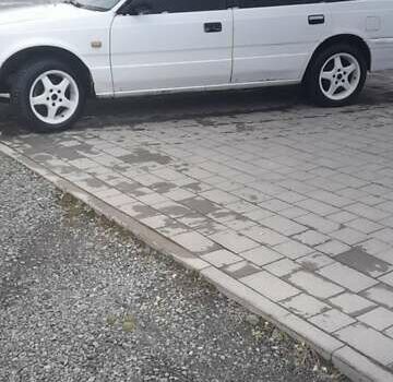 Белый Мазда 626, объемом двигателя 2 л и пробегом 323 тыс. км за 900 $, фото 5 на Automoto.ua