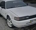 Белый Мазда 626, объемом двигателя 2 л и пробегом 323 тыс. км за 900 $, фото 1 на Automoto.ua