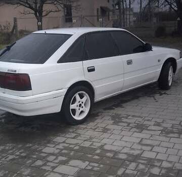 Белый Мазда 626, объемом двигателя 2 л и пробегом 323 тыс. км за 900 $, фото 4 на Automoto.ua