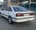 Білий Мазда 626, об'ємом двигуна 2 л та пробігом 350 тис. км за 844 $, фото 1 на Automoto.ua