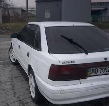 Белый Мазда 626, объемом двигателя 2 л и пробегом 323 тыс. км за 900 $, фото 3 на Automoto.ua