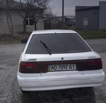 Белый Мазда 626, объемом двигателя 2 л и пробегом 323 тыс. км за 900 $, фото 2 на Automoto.ua